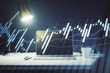 Multi exposure of abstract financial graph on laptop background, financial and trading concept
