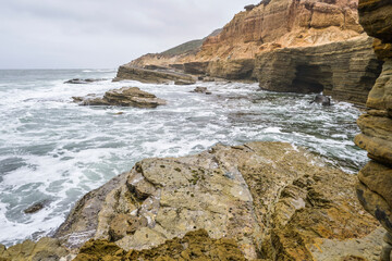 waves crashing on rocks at Cabrillo National Monument
