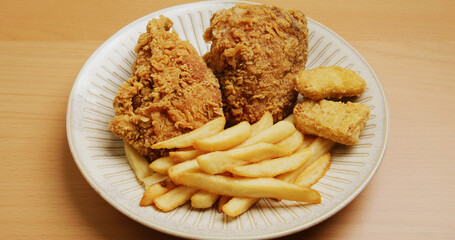 Junk food with french fires, burger and chicken fries