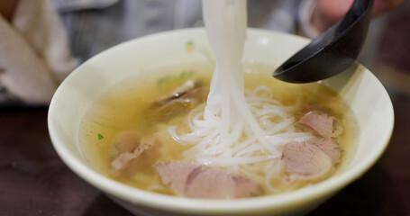 Beef meat rice noodles soup