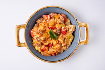 stewed vegetables with meat. on a white background