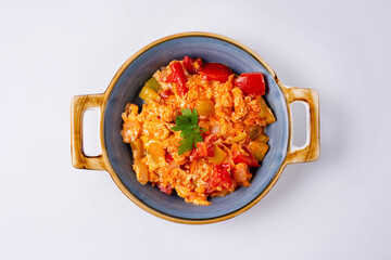 stewed vegetables with meat. on a white background