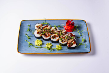 japanese cuisine, sushi rolls on a white background