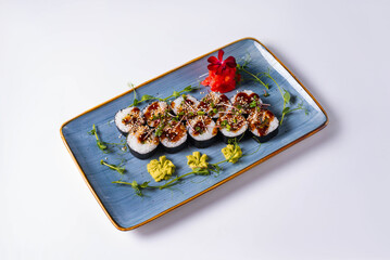 japanese cuisine, sushi rolls on a white background