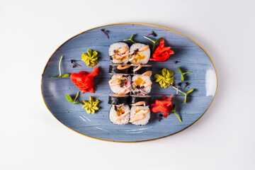 japanese cuisine, sushi rolls on a white background