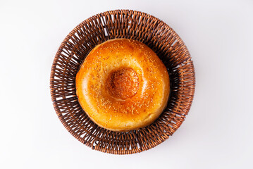 bread, flatbread in a wicker round basket on a white background