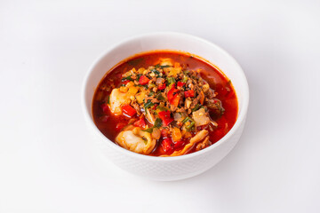 Chuchwara soup, minced beef, onion, dough. on a white background