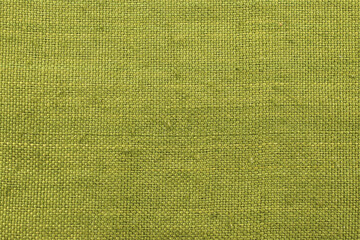 rough light green fabric texture backdrop, close up