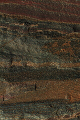 The texture of stone in a mining quarry. The natural appearance of stone extracted from the ground