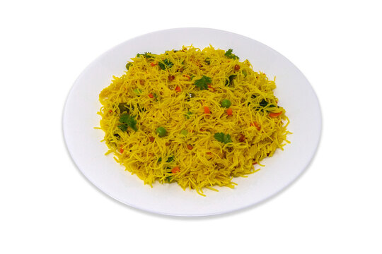 Homemade popular south indian breakfast semiya uppittu upma semolina vermicelli on a white plate