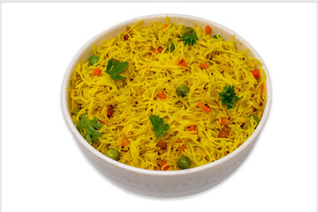 Homemade healthy delicious vermicelli semiya uppittu upma semolina with onion, peas, carrot, curry leaves, dry chilli, popular south indian breakfast menu on a white bowl - obrazy, fototapety, plakaty