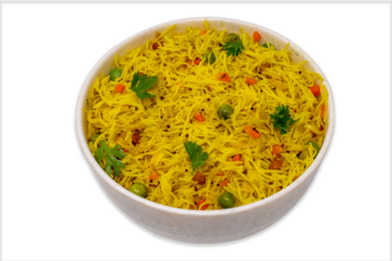 Homemade healthy delicious vermicelli semiya uppittu upma semolina with onion, peas, carrot, curry leaves, dry chilli, popular south indian breakfast menu on a white bowl
