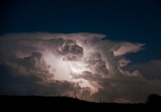 Lightning, cumulo-nimbus clouds and thunderheads.