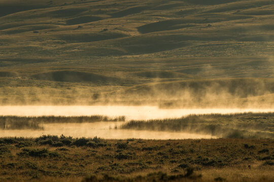 Scenic view of the mist rising from the Blacktail Ponds at sunrise, Blacktail Plateau; Yellowstone National Park, United States of America