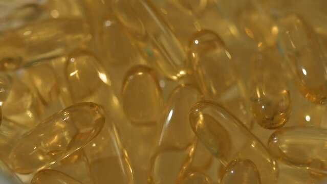 Omega 3 capsules. gelatine softgels. Rotating Close Up