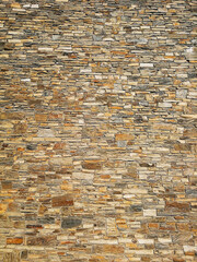 Stone wall background in modern construction