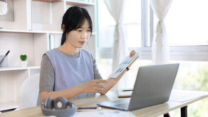 Women are greeting friends and teachers through video chats and greeting them with cheerful expressions, Online communication , Stay home, New normal, VDO Call, Social distancing, Internet learning.