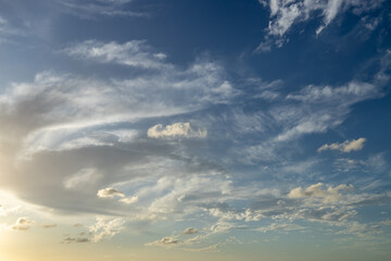 Dreamy clouds during a sunset. Roof replacement tool.