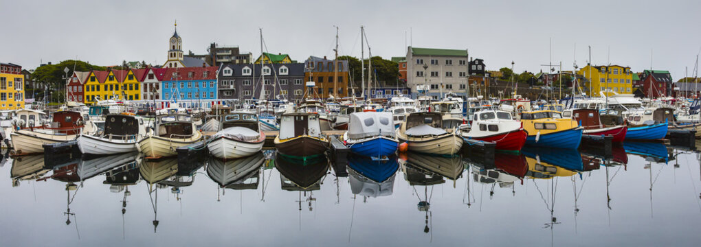 View of a colorful harbor in Torshavn's historic Tinganes District.