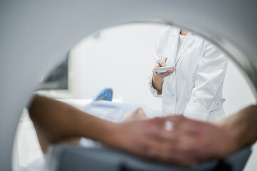 Patient undergoing the MRI investigation in the medical center