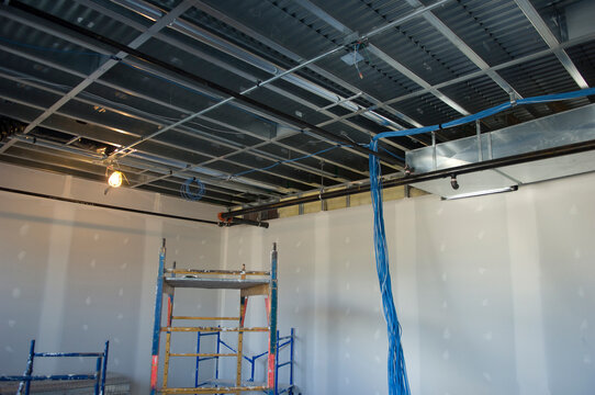 Unfinished commercial room, including high speed computer wiring and freshly installed drywall; Lincoln, Nebraska, United States of America