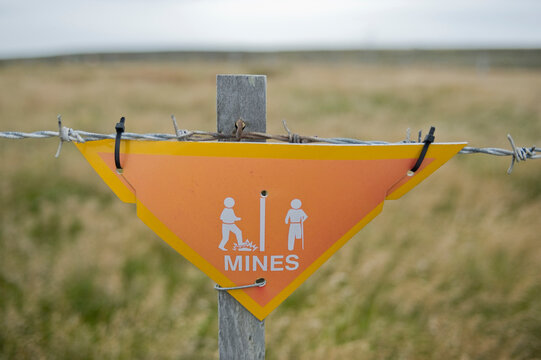Sign warning of land mine danger in Stanley, Falkland Islands; Stanley, Falkland Islands, British Overseas Territory