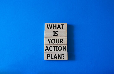 What is your action plan symbol. Wooden blocks with words What is your action plan. Beautiful blue background. Business and What is your action plan concept. Copy space