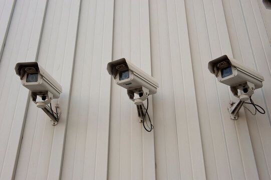 Surveillance cameras on the exterior of a business; Houston, Texas, United States of America
