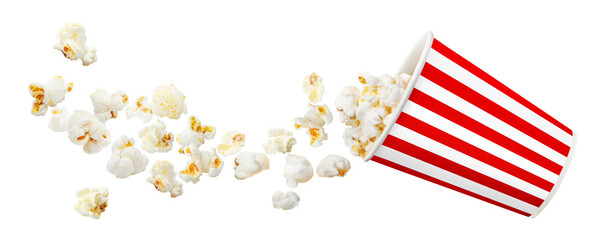 Flying popcorn from red striped paper cup, isolated on white background