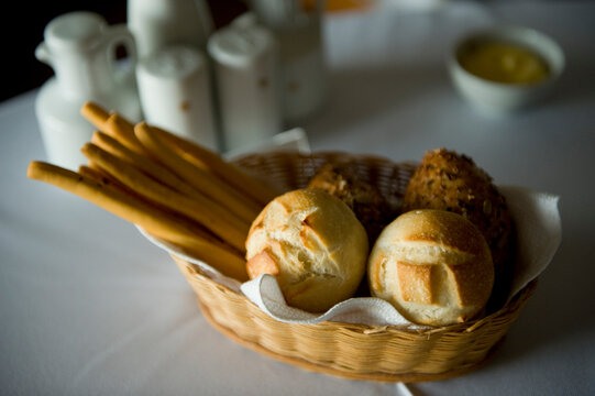 Different kinds of bread are displayed in a basket; Lincoln, Nebraska, United States of America