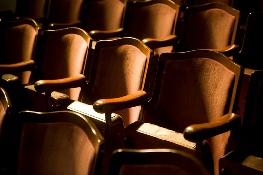 Sunlight falls onto antique theater seating; Waterville, Kansas, United States of America