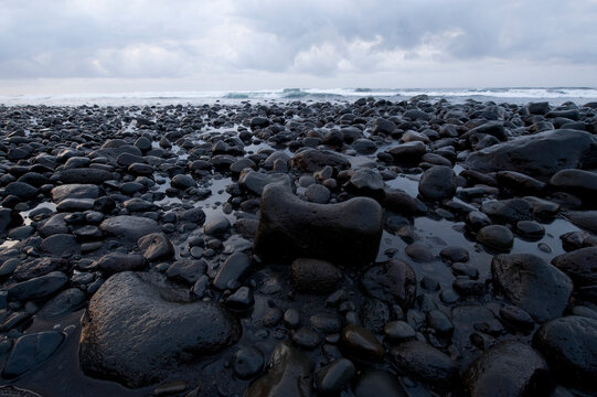 Rocks on the beach near Playa Tortuga, Southern Bioko Island, Equatorial Guinea; Bioko Island, Equatorial Guinea