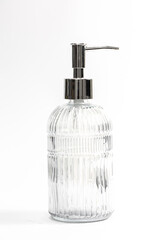 Dispenser for liquid soap isolated on white background.