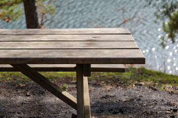 wooden table by the lake