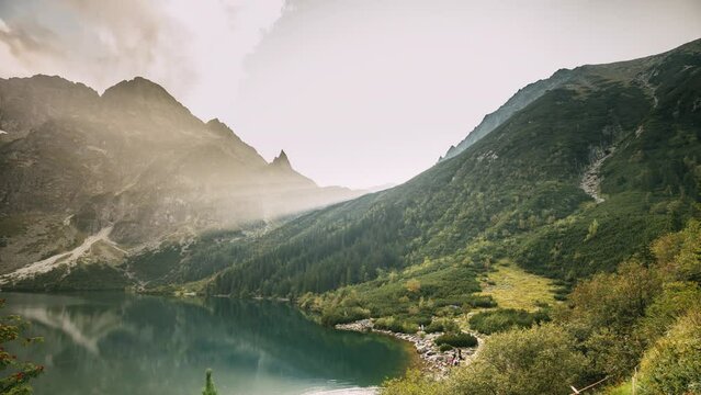 Tatra National Park, Poland. Calm Lake Czarny Staw Under Rysy And Summer Mountains Landscape. Beautiful Scenic View Of Lake. UNESCO World Heritage Site. Polish Nature.