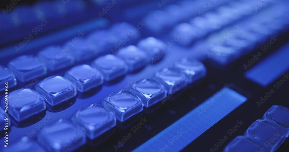 Poster focus shift change via transparent buttons of control studio in blue light of broadcast audio video 