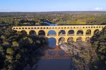 Printed roller blinds Pont du Gard The "Pont du Gard" is an ancient Roman aqueduct bridge built in the first century AD to carry water (31 mi) .It was added to UNESCO's list of World Heritage  Sites in 1985