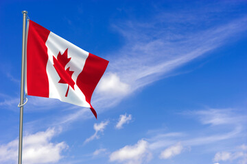 Canada flags over blue sky background. 3D illustration