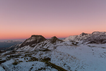 sunrise over the snowy mountains during spring (Tilisunasee, Tschagguns, Vorarlberg, Austria)