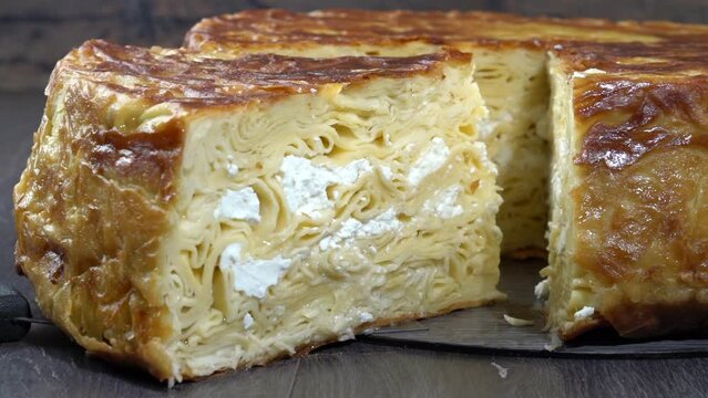 Turkish traditional pastry, Su b&ouml;reği, Karak&ouml;y B&ouml;reği, Karakoy b&ouml;regi, su boregi, Turkish Su Boregi pie, Tabla borek or burek in plate. Bosnak boregi, gocmen boregi, kapali pide, pide, kıymalı borek, 