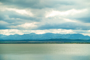 Fototapeta na wymiar river with a view of the mountains in nature