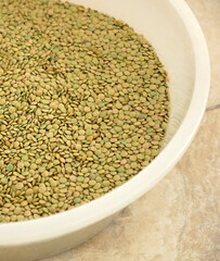 dried green lentils for table and food in a bowl,