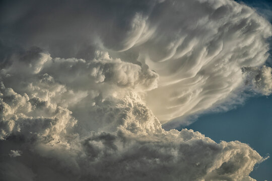 Huge supercell thunderheads form over the northern plains, seems almost Biblical in nature; Alberta, Canada