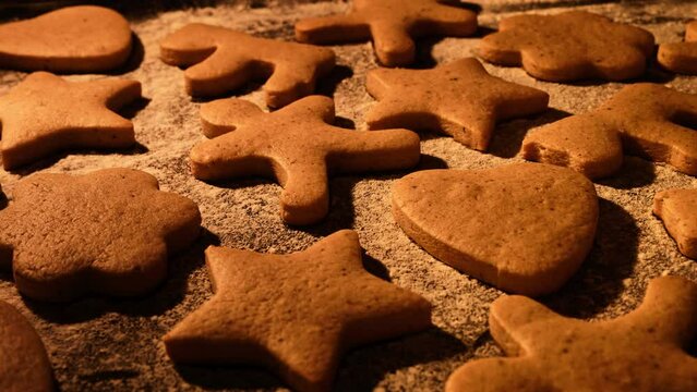Time lapse of gingerbread baked. Christmas cake, cookies baked. Bakery concept. Tasty brown cookies. Baked christmas cookies. Close-up in 4K, UHD