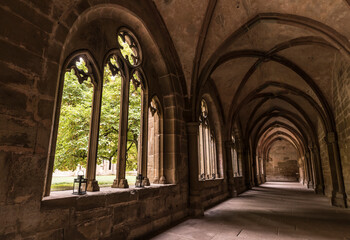 Aisle of a historic monastery.