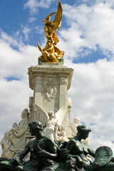 London, England, in the Summer looking at the Victoria Memorial monument to Queen Victoria, located...