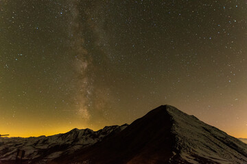Plakat starry night sky with the milkyway in the alps (Austria)