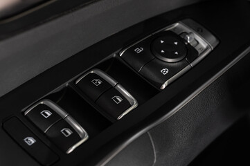 Driver door panel with buttons