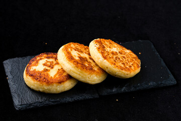 Cheese pancakes or syrniki, traditional Russian breakfast.