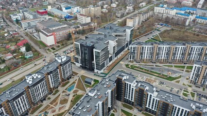 Fototapeta premium Minsk, Belarus - 30.11.2022: Construction of a residential multi-storey microdistrict Levada in the center of Minsk on Orlovskaya street. Residential complex Levada. Expansion and reconstruction of Mi